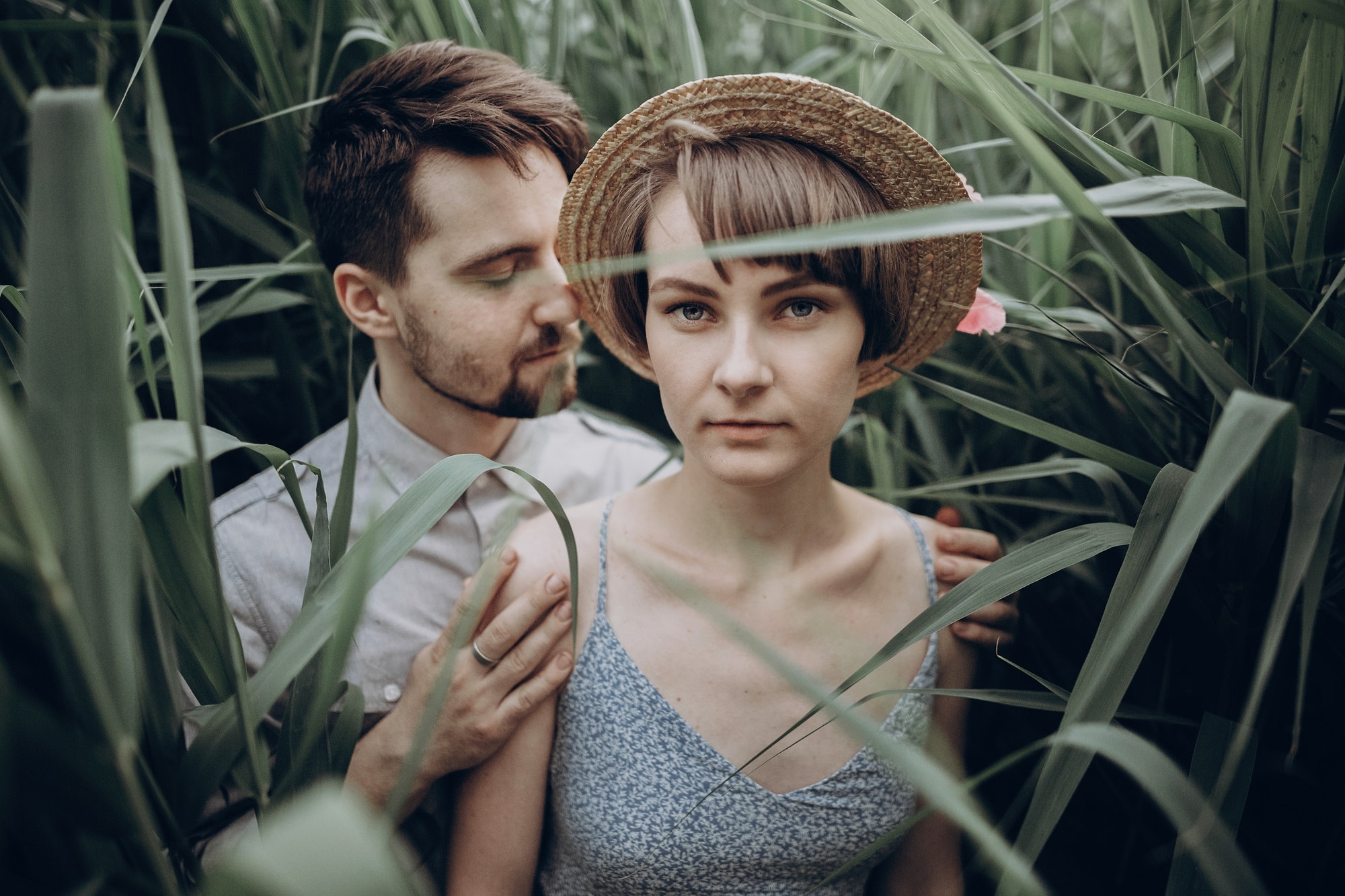 stylish-rustic-bride-and-groom-embracing-in-windy-high-reed.jpg